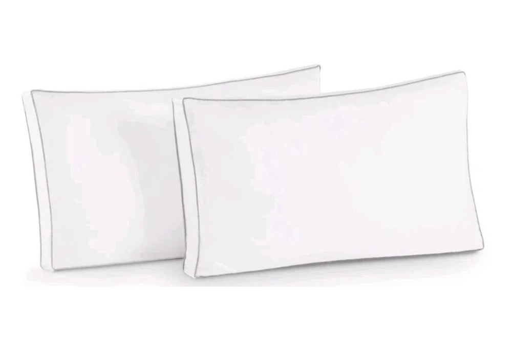 Two white pillows on a white background