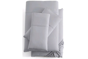 Grey bed sheets with brand logo on a white background