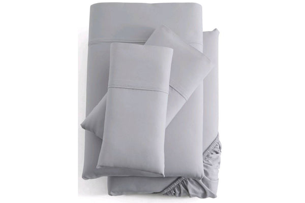 Grey bed sheets with brand logo on a white background