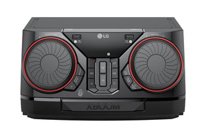 Sistema de sonido LG con detalles en rojo sobre fondo blanco.