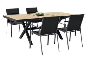 Outdoor beige table with black sides and with four armchairs on a white background