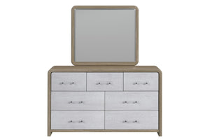 Light bronze colored wooden dresser with mirror with six, light grey drawers on a white background.