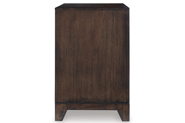 Sideview of a dark brown nightstand on a white background.
