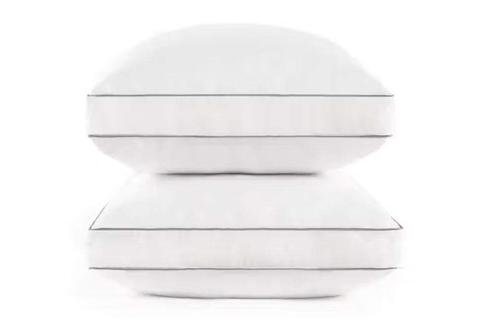 Two white pillows on a white background