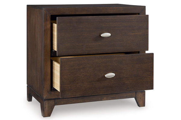 Dark brown, wood nightstand with two, open drawers on a white background.