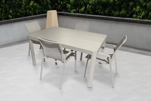 Outdoor dining set with a table and chairs on a patio