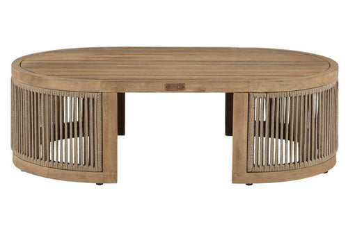 Round wooden coffee table with wicker side panels on a white background