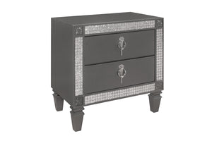 Grey, silver and jeweled nightstand of two drawers with silver handles on a white background.