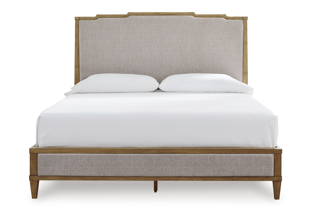 Front view of bed with wooden frame and upholstered headboard on a white background.