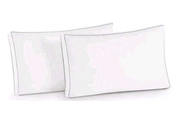 Two white pillows on a white background