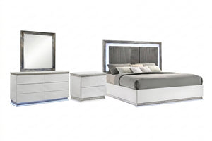 Juego de habitación de color blanco y gris con luces LED integradas que incluye una cama, una mesa de noche y un gavetero con espejo sobre un fondo blanco. 