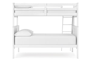 Litera de metal blanca sobre fondo blanco