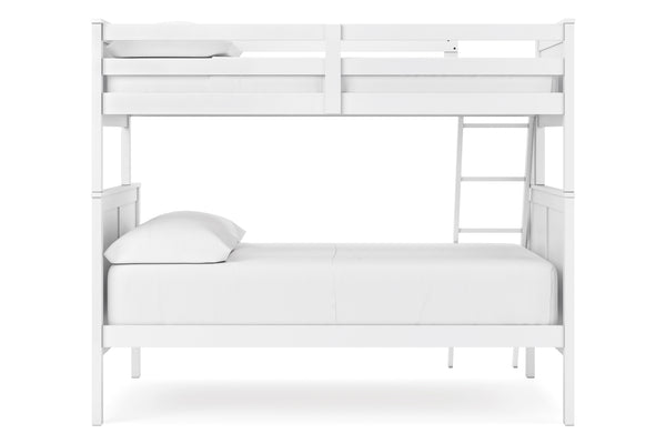 Litera de metal blanca sobre fondo blanco