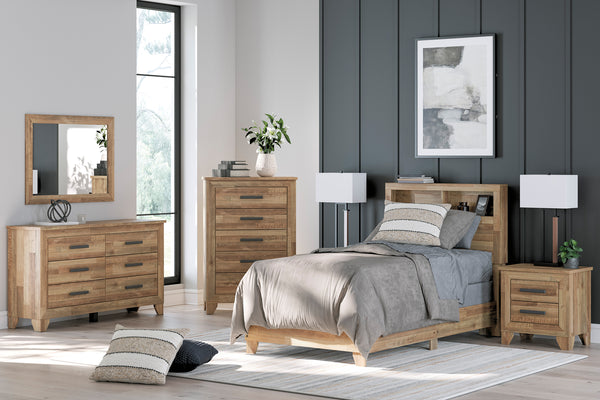 Conjunto de muebles de habitación de madera con cama con estantería en la cabecera, gavetero con espejo y lámparas en una habitación moderna.
