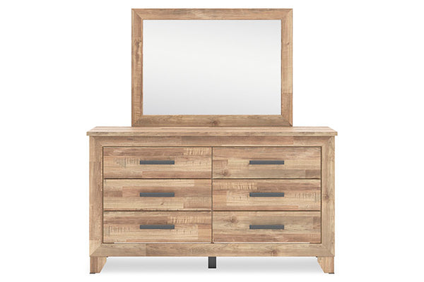 Gavetero de madera con espejo sobre fondo blanco