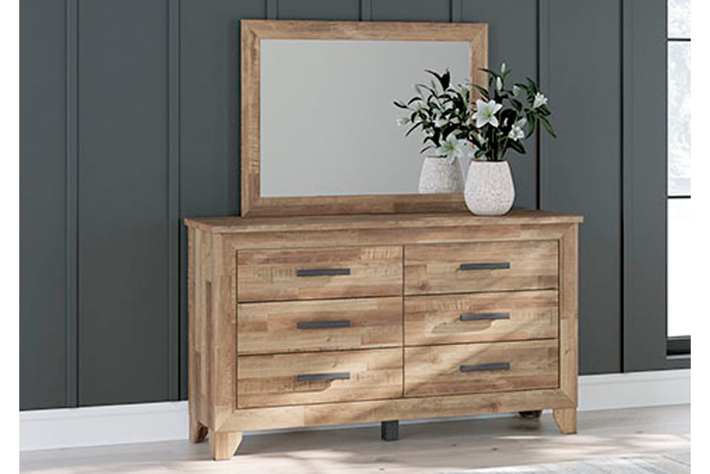 Gavetero de madera con espejo sobre fondo blanco