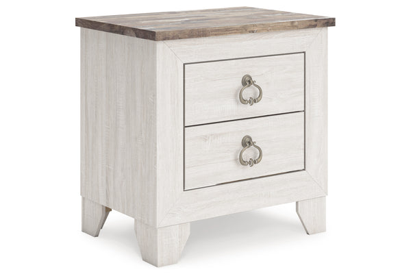 Mesita de noche blanca con dos gavetas y tapa de madera sobre fondo blanco.