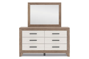 Gavetero con espejo sobre fondo blanco