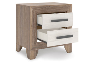 Mesita de noche de madera con dos gavetas abiertas sobre fondo blanco