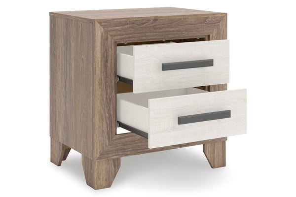 Mesita de noche de madera con dos gavetas abiertas sobre fondo blanco