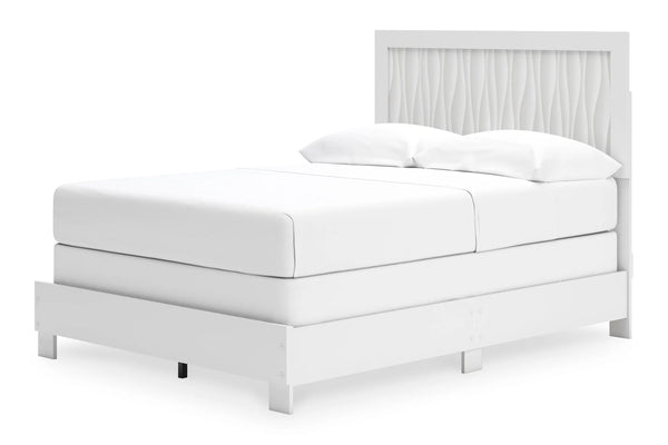 Estructura de cama blanca con mattress y almohadas sobre fondo blanco