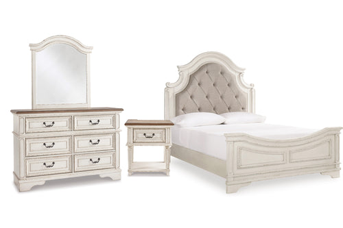Conjunto de dormitorio antiguo blanco compuesto por una cama, una mesita de noche y un gavetero con espejo sobre fondo blanco.