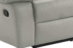 Seccional reclinable gris con especial atención a los reposabrazos y el asiento.