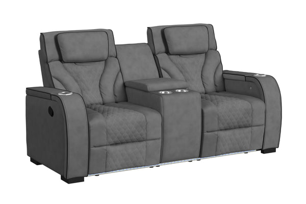 Loveseat reclinable de dos plazas en color gris oscuro, con tapizado acolchado de patrón geométrico, cabeceras ajustables, consola central con portavasos y compartimentos integrados. Diseño moderno con iluminación LED en la base.