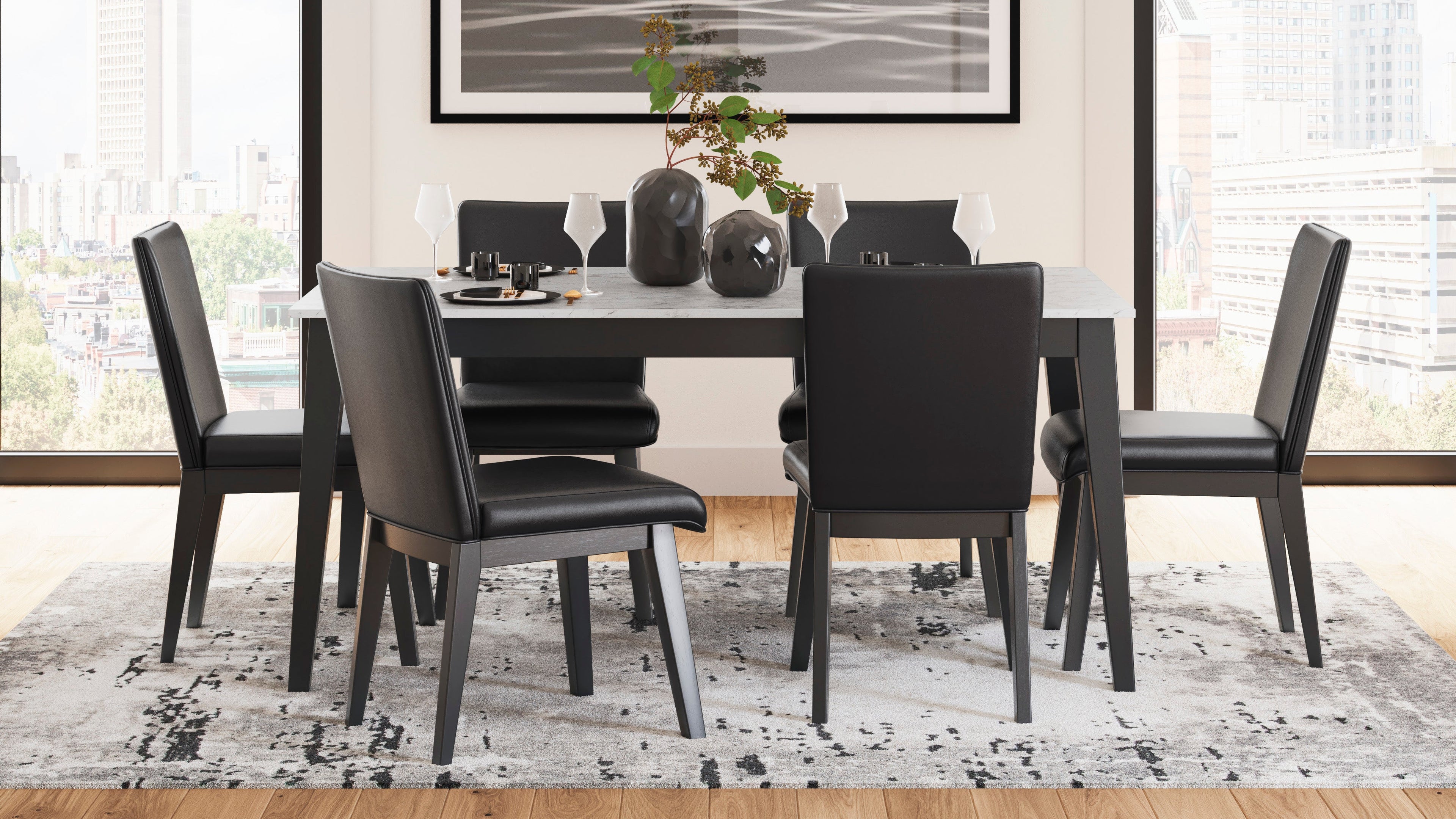 Dining room with a table and chairs in a modern interior setting.