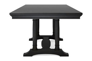 Una mesa de comedor de madera negra con tablero rectangular y base de pedestal tipo caballete, mostrada sobre un fondo blanco liso.