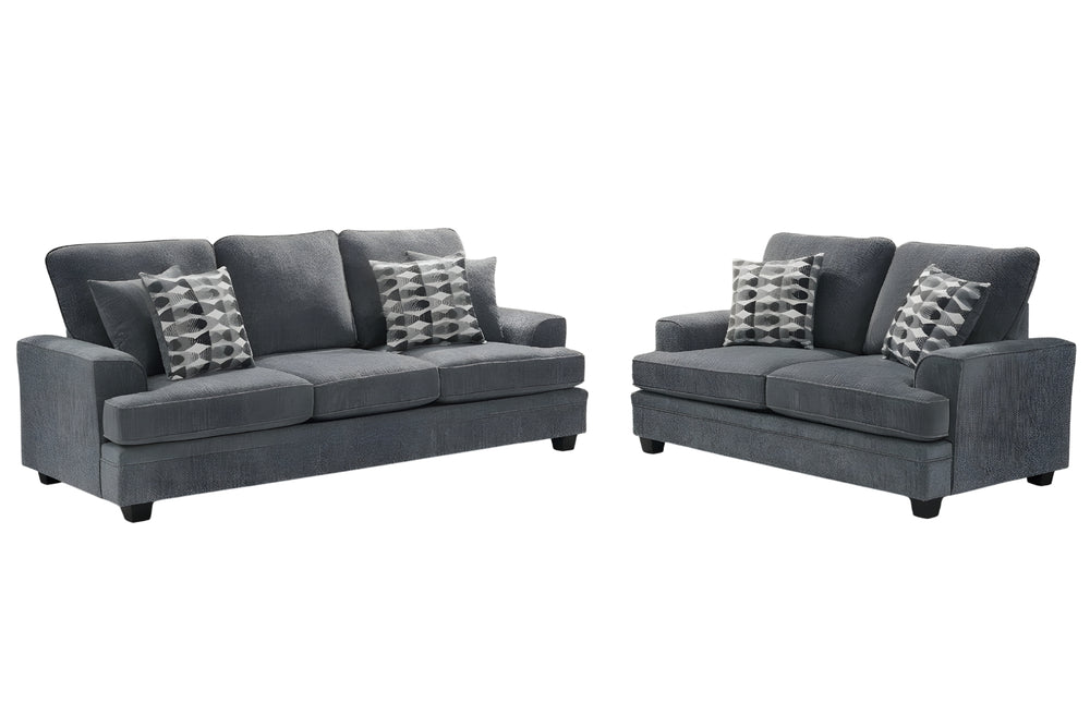 Conjunto de sofá y loveseats grises con cojines estampados sobre fondo blanco.