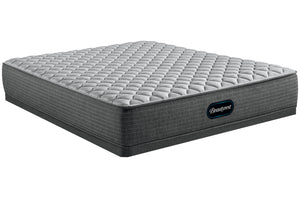 Mattress gris con logo "Beautyrest" sobre un fondo blanco. 