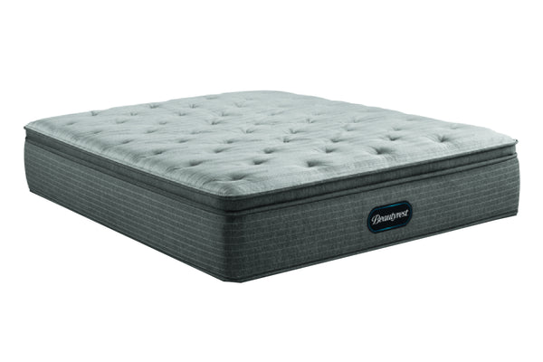Gris mattress con logo "Beautyrest" sobre un fondo blanco. 