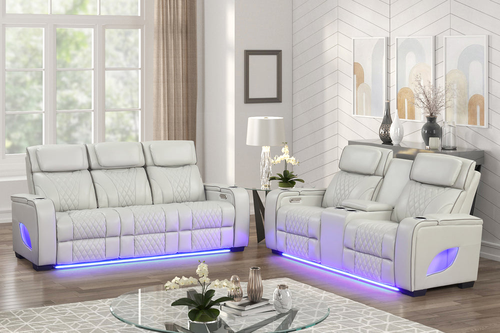 Moderno Juego de Sala con sofá y loveseat reclinable de cuero beige y mesa de centro.