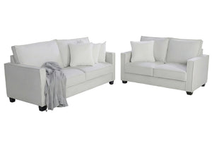 Conjunto de loveseat y sofás beige con cojines sobre fondo blanco.