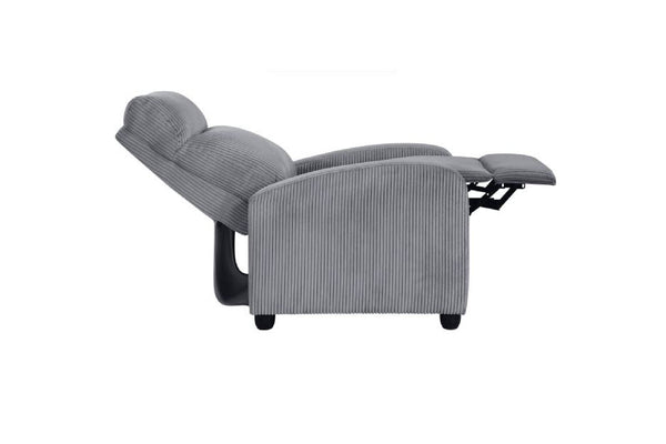 Vista lateral de silla reclinable gris sobre un fondo blanco. 