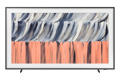 Televisor de pantalla plana con marco negro delgado que muestra una obra de arte abstracta en tonos gris, blanco, negro y coral. Su diseño tipo cuadro permite integrarlo como elemento decorativo en espacios modernos.