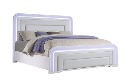 Cama moderna con iluminación LED sobre fondo blanco.