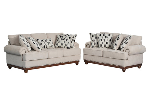 Conjunto de sofá y loveseat beige con cojines estampados sobre fondo blanco.