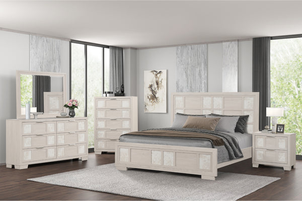 Un juego de habitación en acabado desgastado crema claro o blanco marfil, que incluye estructura de cama, mesa de noche, chest, gavetero y espejo. Diseñado en una habitación moderna con ropa de cama gris y pisos de madera oscura.