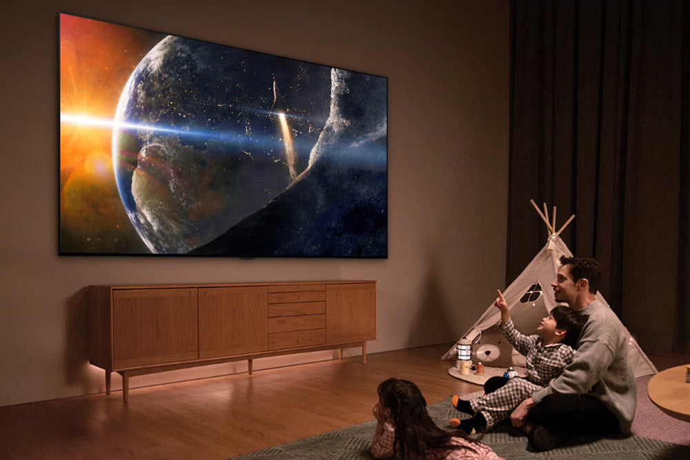 Televisor inteligente que muestra un patrón abstracto colorido sobre un fondo blanco