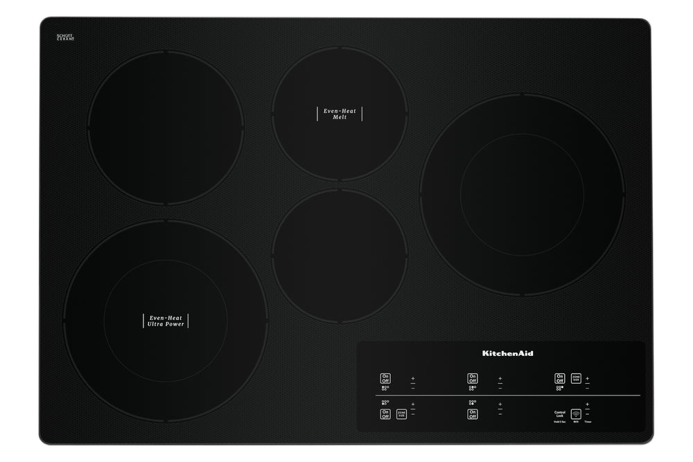 Un tope empotrable de vitrocerámica negra con cuatro elementos calefactores circulares y un panel de control táctil en la esquina inferior derecha, que luce el logotipo de KitchenAid.