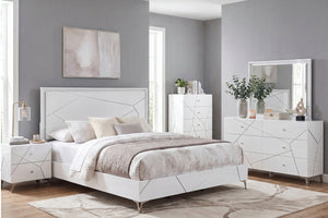 Un juego de habitación moderno con cama blanca con detalles geométricos, mesa de noche, cómoda y chifonier a juego, decorado con ropa de cama neutra en beige y blanco en una habitación de paredes grises.