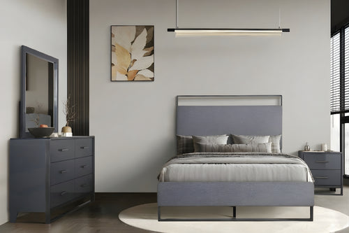 Juego de habitación de colores grises oscuros que incluye una cama, una mesa de noche y un gavetero con espejo en una habitación moderna. 