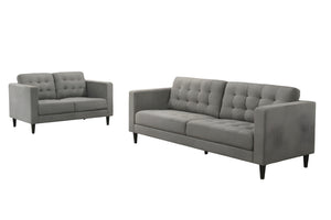 Conjunto de sofá y loveseat grises sobre fondo blanco.