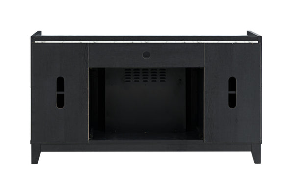 Vista posterior de mesa de entretenimiento de color negro y con chimenea integrada sobre un fondo blanco. 