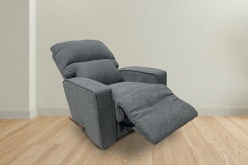 Butaca reclinable manual de color gris en una sala neutral. 