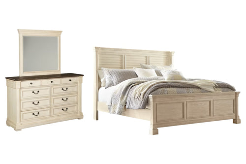Beige bedroom set featuring a bed and a dresser with mirror on a white background. 