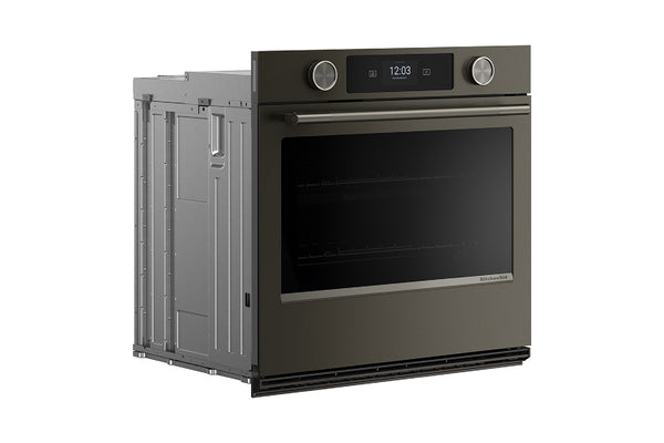 Horno empotrado con exterior gris carbón oscuro y puerta de cristal negro, mostrado desde un ángulo de tres cuartos sobre un fondo blanco liso.