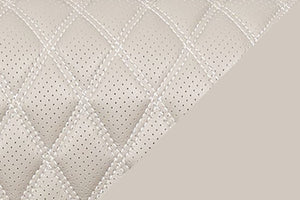 Primer plano de material de sofá reclinable de color beige. 
